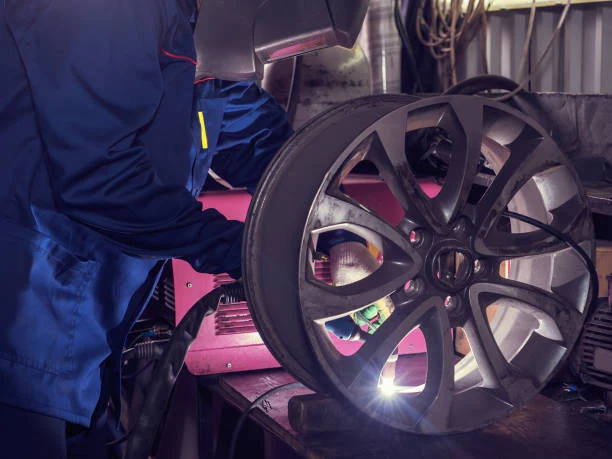 Alloy wheel being professionally refinished