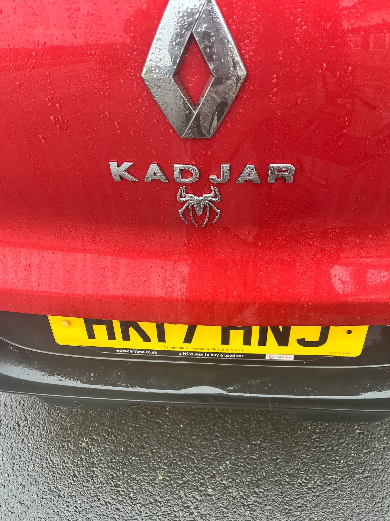 Red tailgate after dent repair