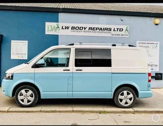 Van with professionally tinted windows outside the LW workshop